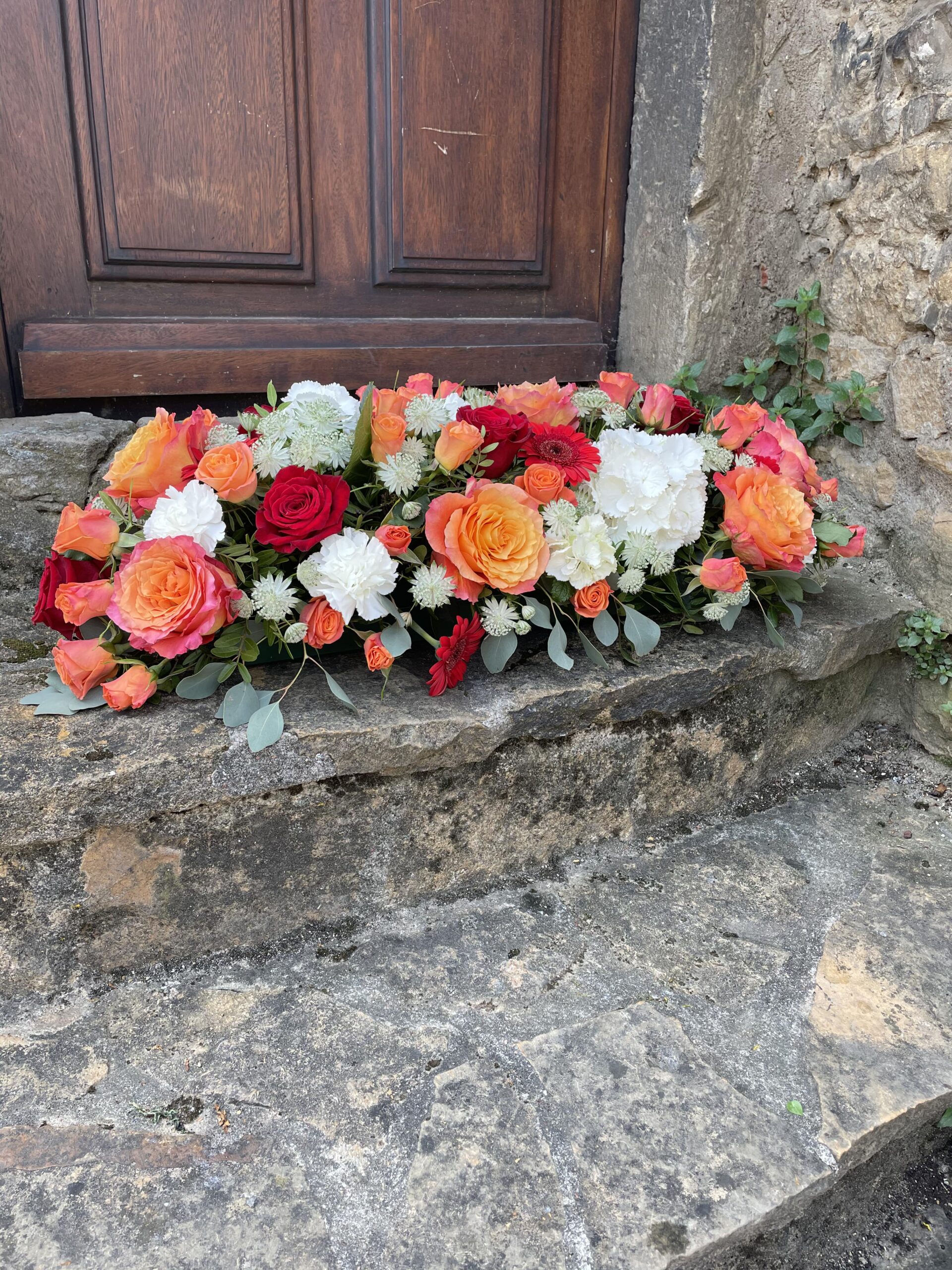 Dessus de cercueil fleuri